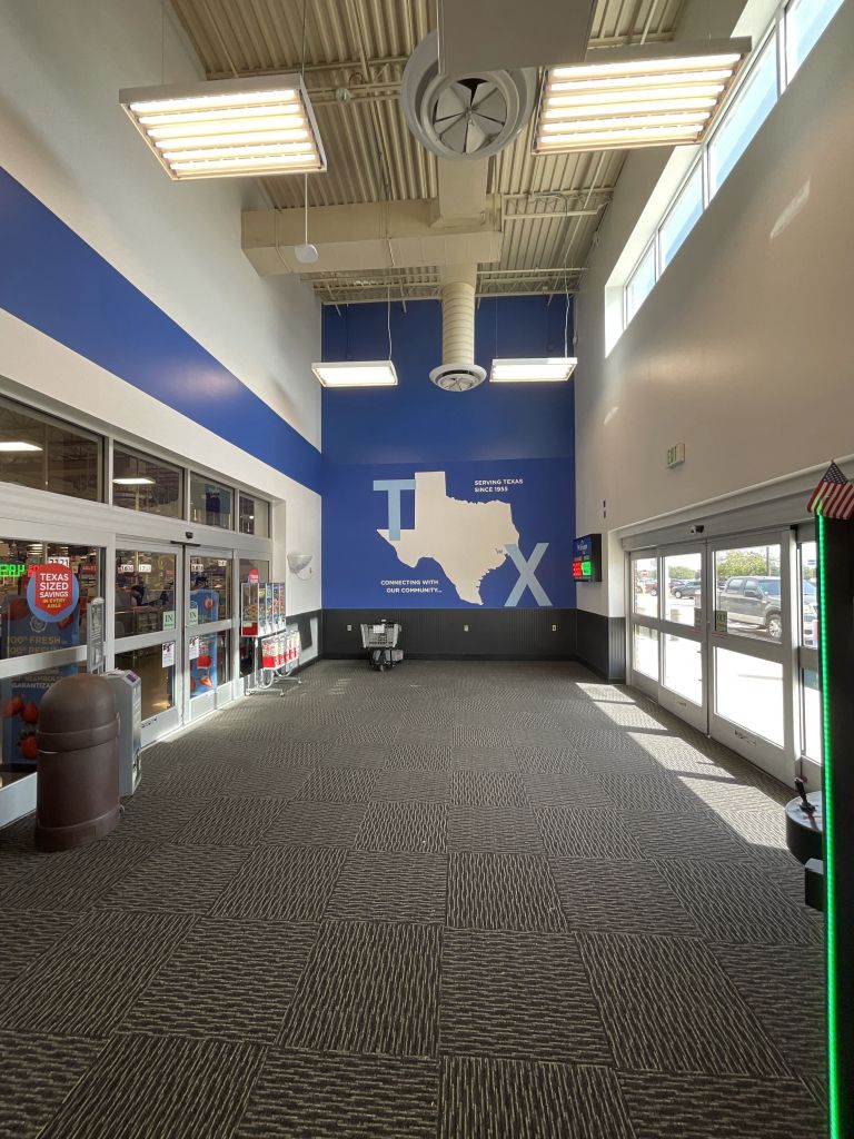 Finished Texas Decor vestibule with Texas wall graphic and marlite wainscot