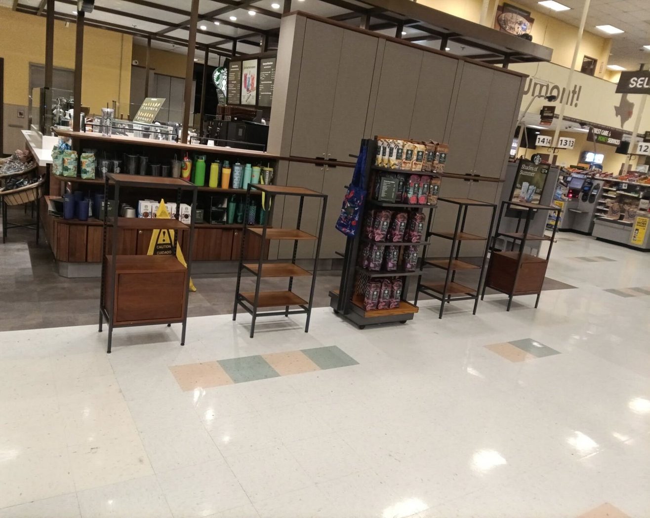 Finished in-store Starbucks kiosk with fixtures and retail displays